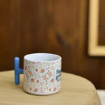 Bugün güzel bir gün yazılı mavi kulplu kupa